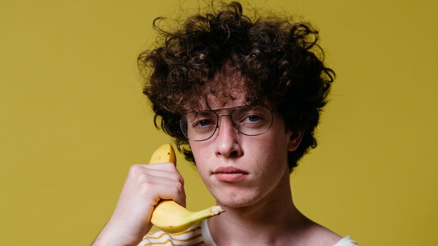 a man holding a banana